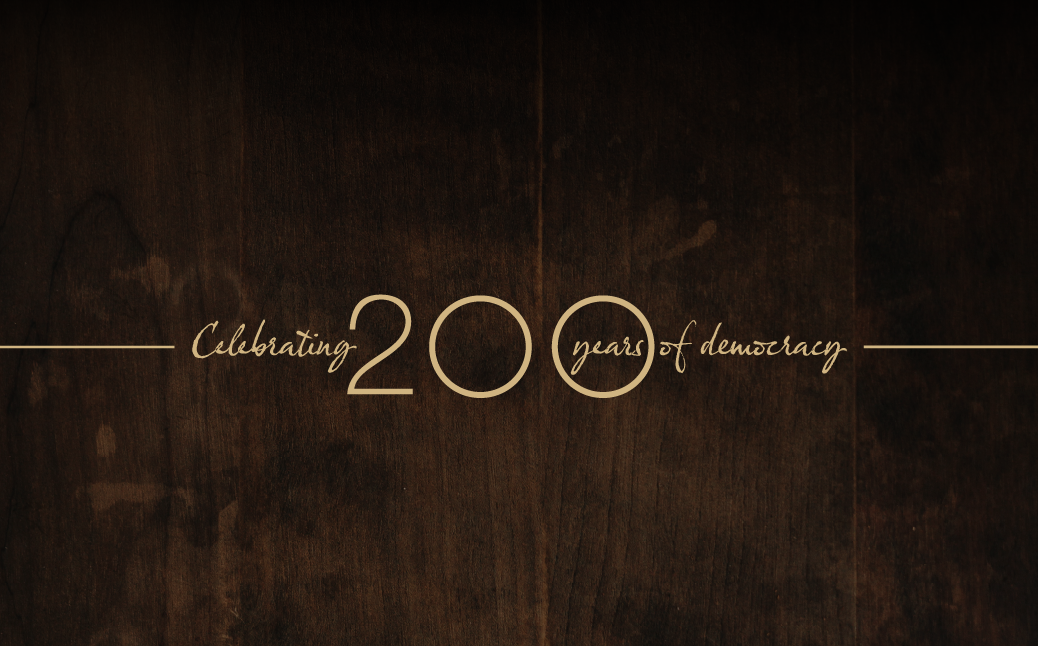 Bicentenary-Exhibition-Celebrating-200-years-of-democracy-wooden-background