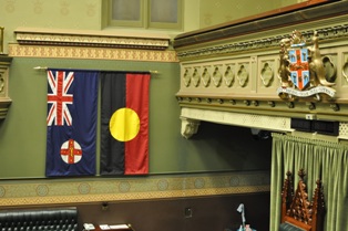 Inside the LA Chamber Showing the Coat of Arms and State Flag