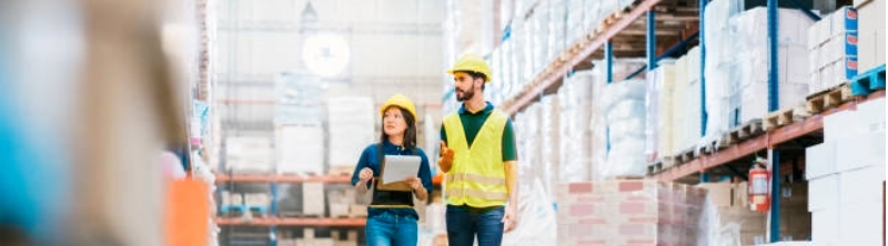 Workers inspecting a warehouse