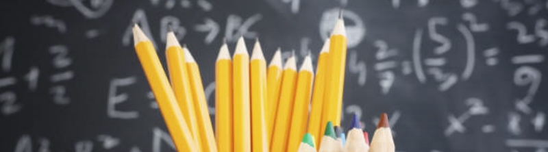 Pencils and a blackboard