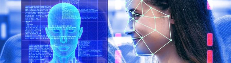 Facial recognition nodes overlaid on woman's smiling face next to a digital model of her face